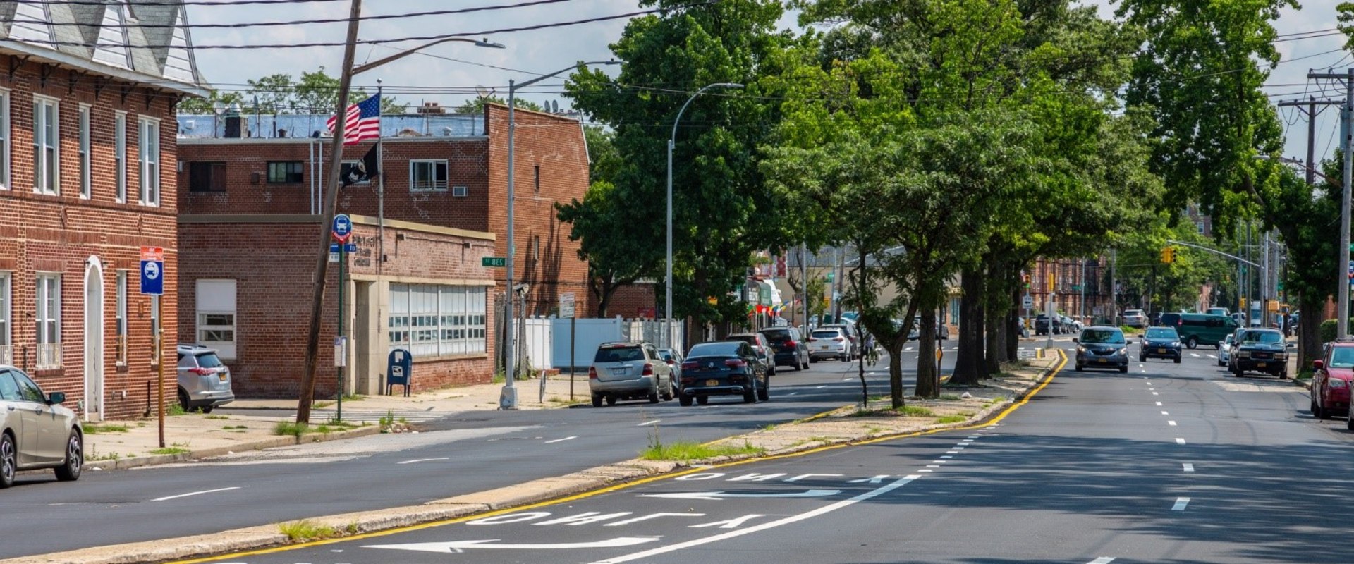 What Services Does the Community Board in Flushing, NY Provide to Local Businesses and Organizations?