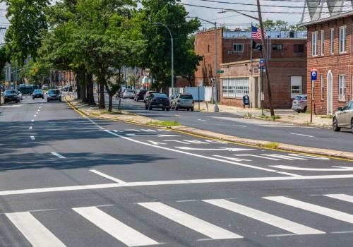 What Services Does the Community Board in Flushing, NY Provide to Local Businesses and Organizations?